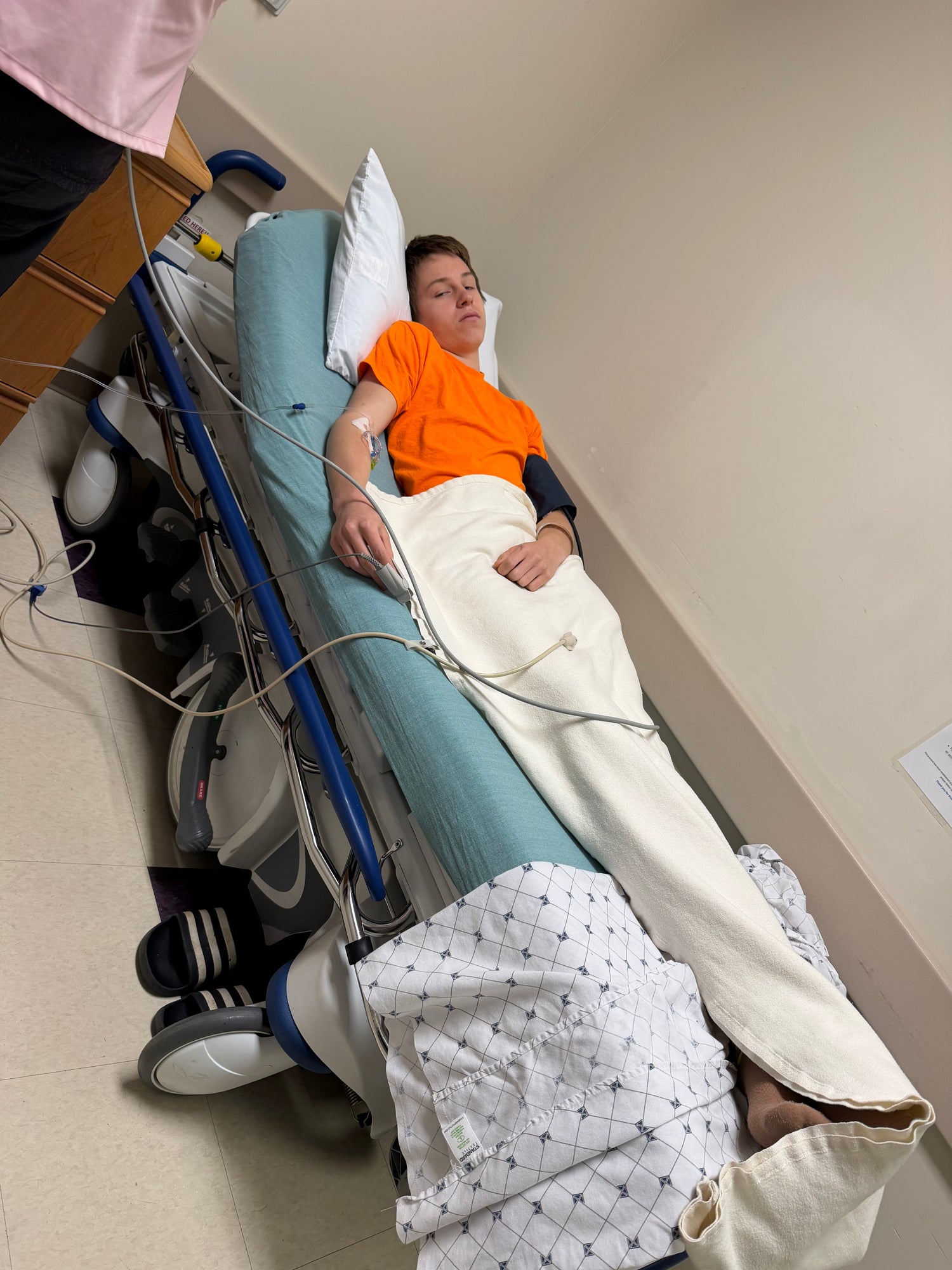 My son laying in his hospital bed, totally devoid of any energy and his usual personality